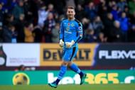 BURNLEY, ENGLAND - NOVEMBER 05: Thomas Heaton of Burnley (C) celebrates his sides first goal during the Premier League match between Burnley and Crystal Palace at Turf Moor on November 5, 2016 in Burnley, England.  (Photo by Jan Kruger/Getty Images)